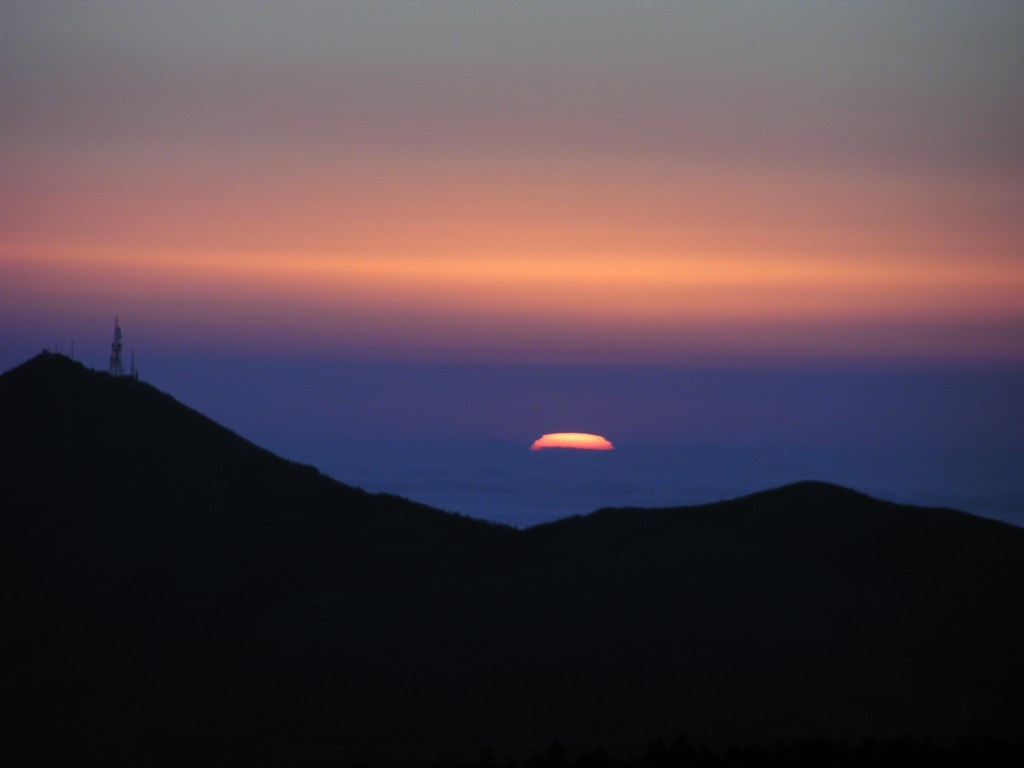 The first sunlight seems to be rising from the middle of the Mediterranean Sea. Observed from Calar Alto, Andalucia, Spain.