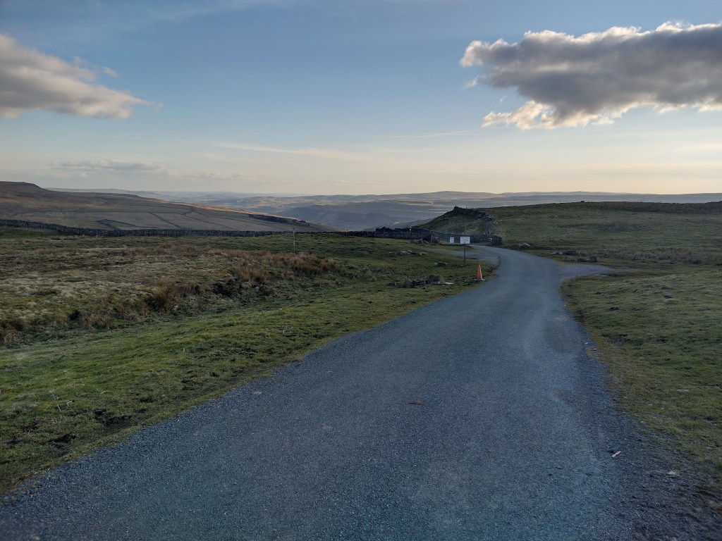 Looking south-west from the pass, down the valley of the River Wharfe and towards the surrounding mountains of the Yorkshire Dales.