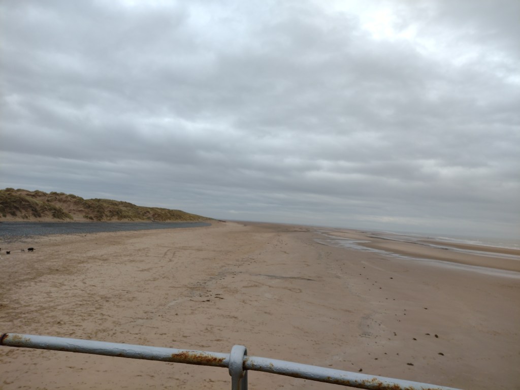 End of Blackpool seafront and start of the dunes on a grey March day